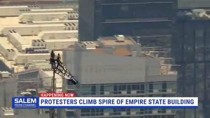 2 People Climb To Top Of Empire State Building